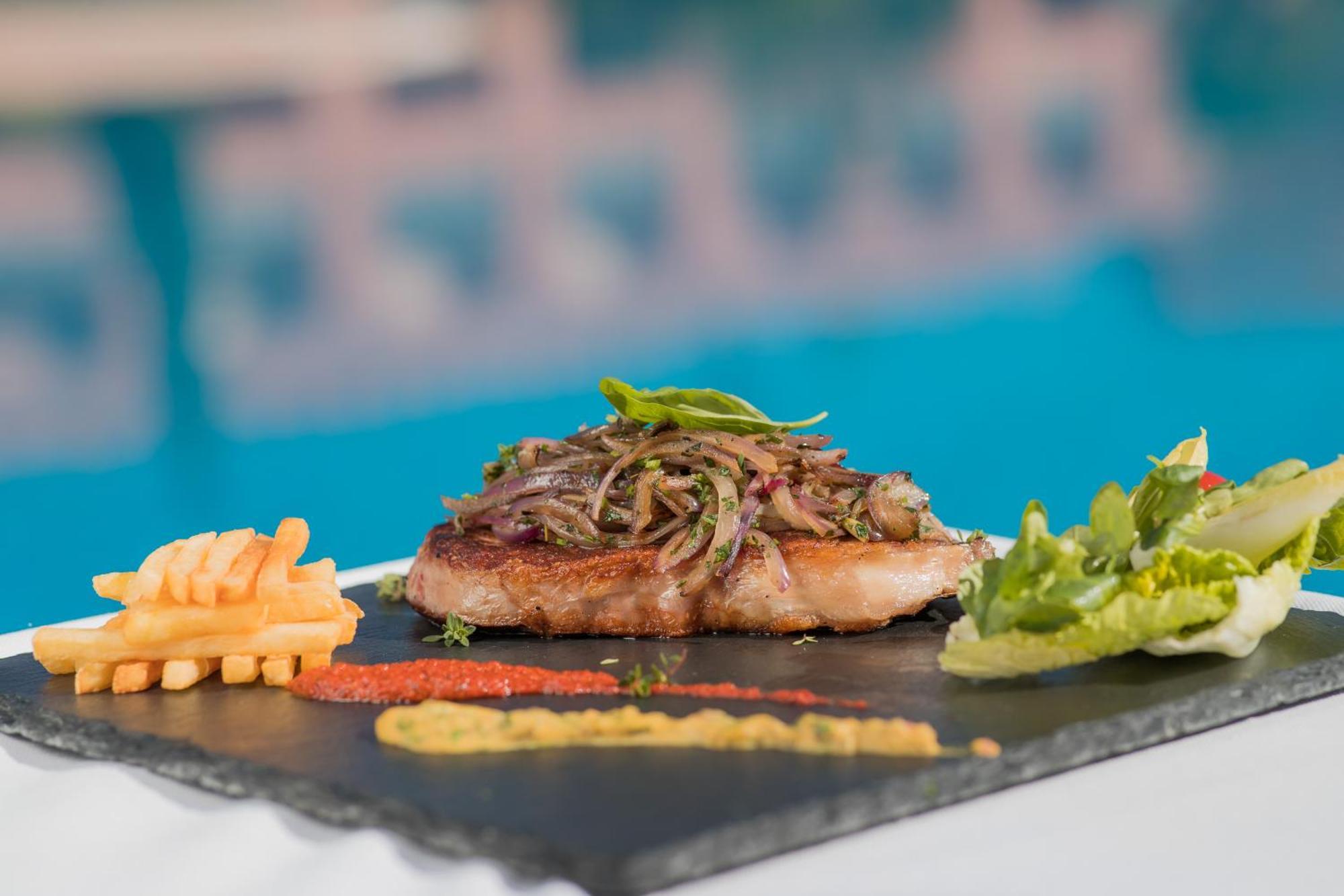 Grand Mogador Agdal & Spa Marrakesh Ngoại thất bức ảnh A steak prepared with the method of cooking